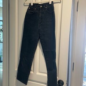90s vintage Versace sport jeans in a dark navy denim size 26